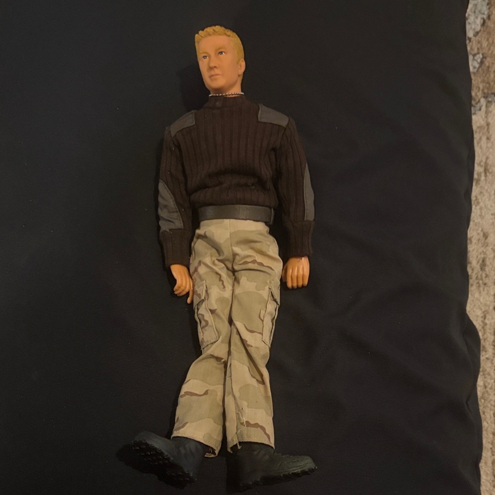 Hasbro Action Figure with Black Boots and Camouflage Pants